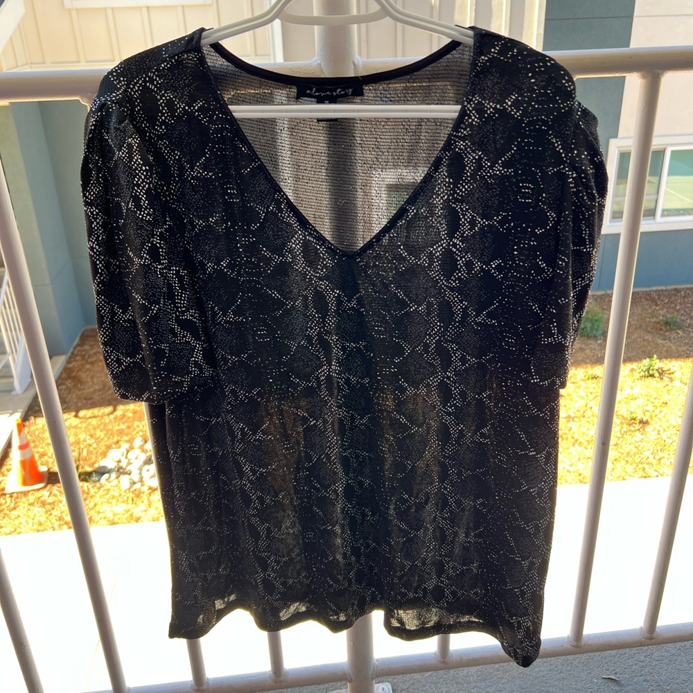 A love story woman’s shirt size 1X